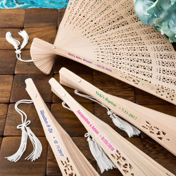 Intricately carved personalized Sandalwood fan favors from PartyFairyBox®