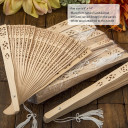 Intricately carved Sandalwood fan favors from PartyFairyBox®