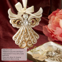 Antique ivory Angel Ornament with a matte gold filigree detailing